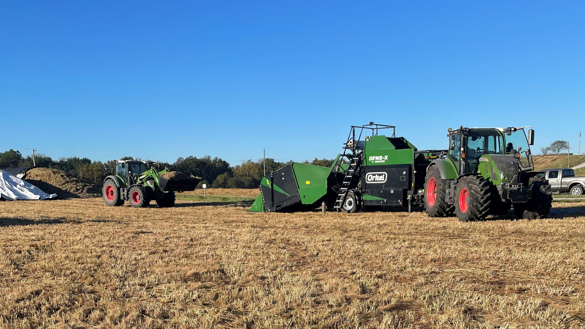 image shows a green orkel compactor